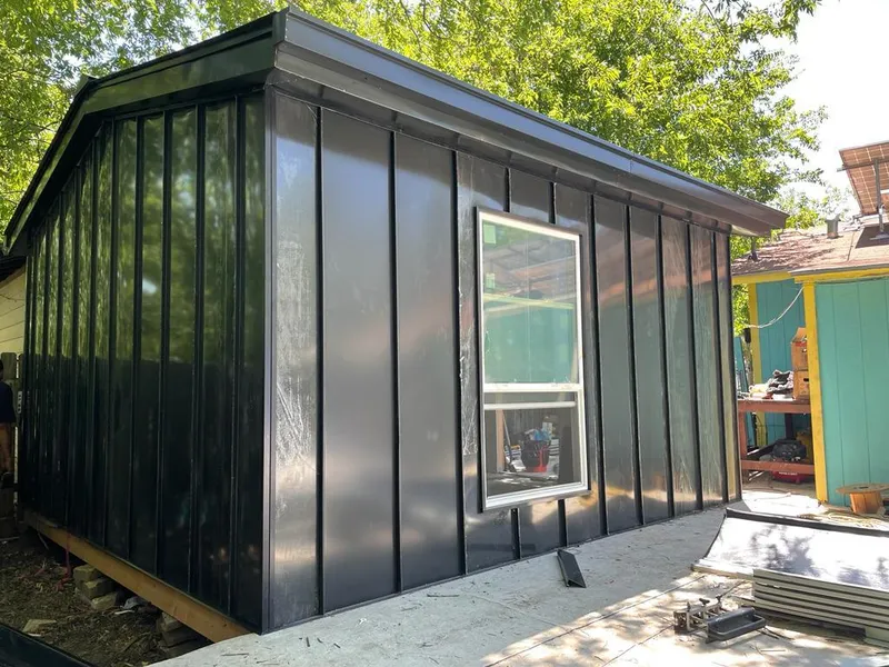 Black standing seam metal wall panels for Roof Inspection in Palisades Park