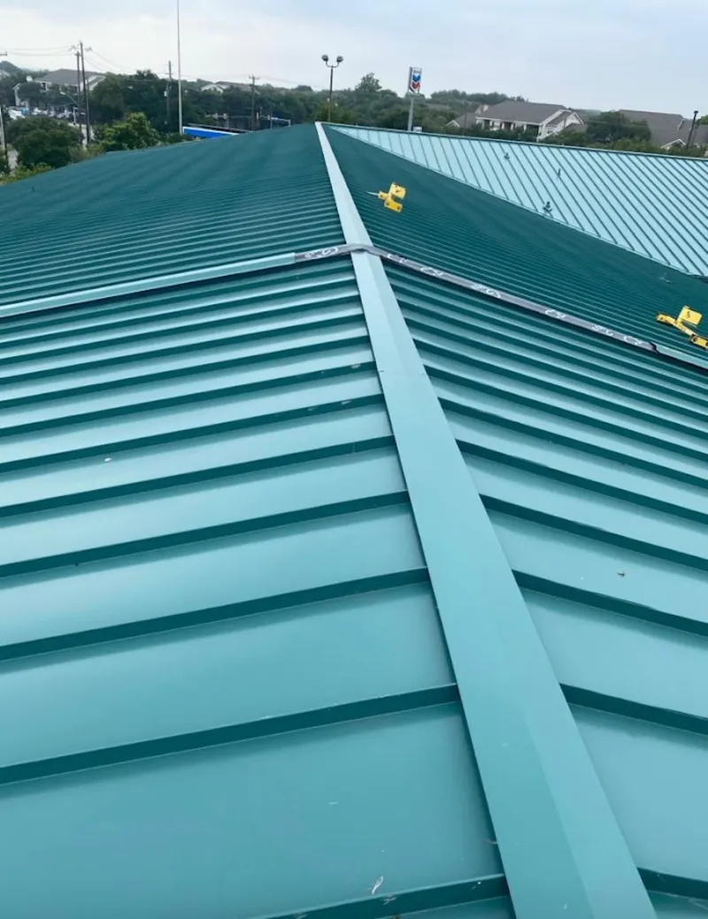 Green commercial metal roof ridge and valley for Metal Roof Repair in Palisades Park